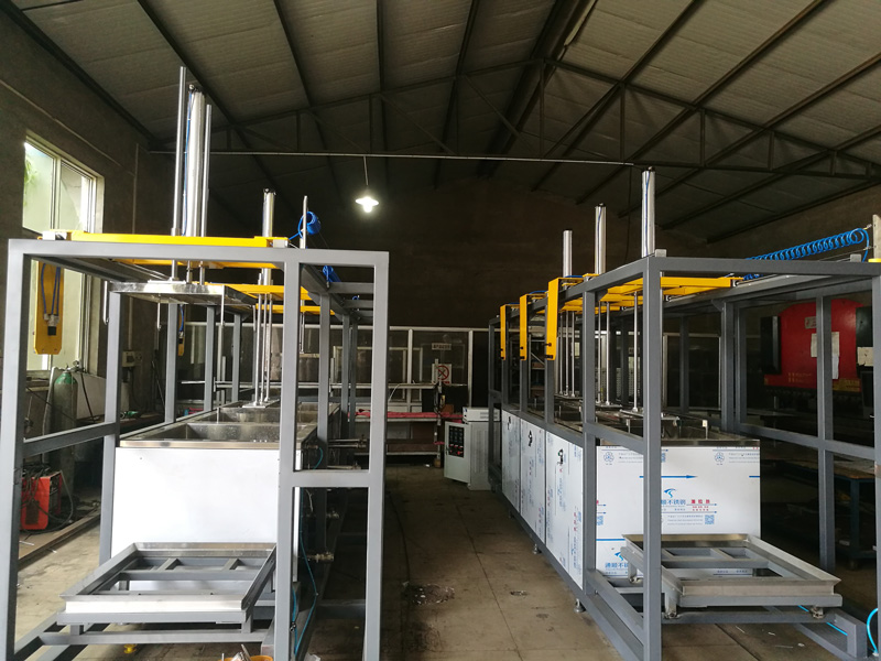 多工位气动提升超声波清洗流水线(图1) 多工位气动提升超声波清洗流水线(图1)